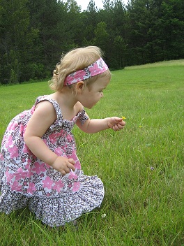 Maggie picking flowers